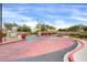 Community entrance featuring a directory sign and wrought iron gates at 2727 N Price Rd # 6, Chandler, AZ 85224