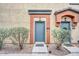 Charming unit exterior with tidy landscaping and inviting front door at 2727 N Price Rd # 6, Chandler, AZ 85224