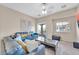 Inviting living room with cozy seating, natural light, and a sliding glass door leading to outdoor space at 2727 N Price Rd # 6, Chandler, AZ 85224