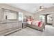 Comfortable main bedroom with balcony, stylish furniture, and a large mirror at 2727 N Price Rd # 6, Chandler, AZ 85224