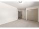 Neutral bedroom features carpet, closet, white walls, and a ceiling light at 3021 W Angela Dr, Phoenix, AZ 85053