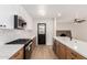 This modern kitchen features stainless steel appliances, updated countertops, and updated cabinetry at 3021 W Angela Dr, Phoenix, AZ 85053