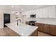 This modern kitchen features stainless steel appliances, updated countertops, and updated cabinetry at 3021 W Angela Dr, Phoenix, AZ 85053