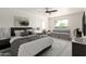 Cozy main bedroom with a seating area, and carpeted floors at 3021 W Angela Dr, Phoenix, AZ 85053