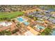 Aerial view of the community pool area featuring multiple pools, lounge areas, and water features at 3376 E Lafayette Ave, Gilbert, AZ 85298