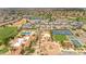 Expansive aerial view of community amenities: pools, tennis courts, green spaces, and luxurious homes at 3376 E Lafayette Ave, Gilbert, AZ 85298