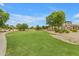 Large green space with path provides community members with a place to recreate at 3376 E Lafayette Ave, Gilbert, AZ 85298