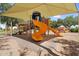 A community playground featuring a shaded play area with slides and climbing structures at 3376 E Lafayette Ave, Gilbert, AZ 85298