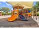 A community playground with covered play equipment and a sandy play area at 3376 E Lafayette Ave, Gilbert, AZ 85298
