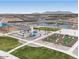 Aerial community view of common recreational areas including play ground, pickle ball courts, and gathering area at 36860 W Santa Maria St St, Maricopa, AZ 85138