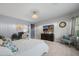 Spacious main bedroom with a work station, TV, walk-in closet, and a calm, inviting atmosphere at 3766 E Ringtail Way, Phoenix, AZ 85050