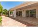 Expansive backyard with covered patio, showcasing ample space and slider door access to the home at 38 E Calavar Rd, Phoenix, AZ 85022
