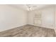 Airy bedroom with neutral tones, stylish ceiling fan, and window shutters for enhanced privacy at 38 E Calavar Rd, Phoenix, AZ 85022