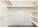 Spacious walk-in closet offers ample shelving and storage, maximizing organization and convenience at 38 E Calavar Rd, Phoenix, AZ 85022