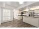 Well-lit eat-in kitchen featuring modern appliances and ample counter space at 38 E Calavar Rd, Phoenix, AZ 85022