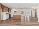 Bright, open kitchen featuring modern cabinets, a center island, and stainless steel appliances at 3910 W Kings Ave, Phoenix, AZ 85053