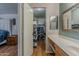 Bathroom with vanity and access to a walk-in closet at 450 N 110Th St, Mesa, AZ 85207