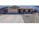 Charming single-story home featuring a spacious driveway, two car garage, and inviting curb appeal at 450 N 110Th St, Mesa, AZ 85207