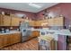 Spacious kitchen featuring stainless steel refrigerator and lots of counter space and storage at 450 N 110Th St, Mesa, AZ 85207