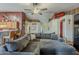 Large living room with comfortable sectional seating, decor details, and an open flow to other areas at 450 N 110Th St, Mesa, AZ 85207