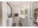 Modern bathroom featuring a stackable washer and dryer unit at 461 W Holmes Ave # 350, Mesa, AZ 85210