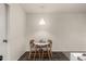 Cozy dining area featuring a round table and stylish chairs under a modern pendant light at 461 W Holmes Ave # 350, Mesa, AZ 85210