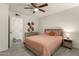 Comfortable bedroom with neutral tones, complemented by a ceiling fan and modern furnishings at 461 W Holmes Ave # 350, Mesa, AZ 85210