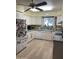 Well-maintained kitchen with white cabinets, modern appliances, and ample counter space for cooking and meal prep at 4814 N 35Th St, Phoenix, AZ 85018
