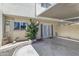 Back patio with french doors, small garden, shaded overhang, and room to customize for comfortable outdoor enjoyment at 527 N Lesueur --, Mesa, AZ 85203