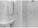 Modern bathroom with white tiled walk-in shower at 527 N Lesueur --, Mesa, AZ 85203
