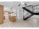 Open kitchen with wood cabinets, white appliances, and an island at 527 N Lesueur --, Mesa, AZ 85203
