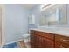 Bathroom with stylish vanity, sink, mirror, and great lighting at 538 E Estevan Ave, Apache Junction, AZ 85119