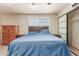 Bedroom boasts cozy carpet, ample natural light, and storage space at 538 E Estevan Ave, Apache Junction, AZ 85119
