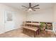 Dining room with stylish table and seating, built-in shelving, and backyard access at 538 E Estevan Ave, Apache Junction, AZ 85119