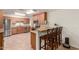 Updated kitchen features stainless steel appliances, granite countertops and breakfast bar at 538 E Estevan Ave, Apache Junction, AZ 85119