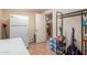 Bright pantry with tile flooring, ample storage, and access to an additional room at 538 E Estevan Ave, Apache Junction, AZ 85119