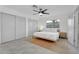 Bright bedroom featuring a neutral palette, ample closet space and large windows at 6201 E Waltann Ln, Scottsdale, AZ 85254