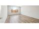 Inviting bedroom with natural light, wood-look floors, and neutral wall colors at 7661 W Meadowlark Way, Florence, AZ 85132