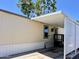 The home features a carport with a white lattice surround, perfect for vehicle storage at 7920 W Glendale Ave # 39, Glendale, AZ 85303