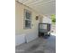 View of covered carport of the mobile home, with space for car and storage at 7920 W Glendale Ave # 39, Glendale, AZ 85303