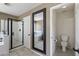 Bathroom with frameless shower, soaker tub and large mirror reflecting fixtures in the space at 1125 E San Carlos Way, Chandler, AZ 85249