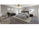 Relaxing bedroom with a ceiling fan and a large cozy bed with brown accents and matching decor at 1125 E San Carlos Way, Chandler, AZ 85249