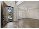 Welcoming foyer with decorative tile and staircase with natural light at 1125 E San Carlos Way, Chandler, AZ 85249