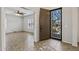 Elegant foyer with decorative tile flooring and view into the living room at 1125 E San Carlos Way, Chandler, AZ 85249