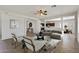 Inviting living room with open layout to kitchen and dining area at 1125 E San Carlos Way, Chandler, AZ 85249
