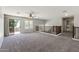 Upstairs loft with sliding glass door leading to balcony, railing and neutral carpet at 1125 E San Carlos Way, Chandler, AZ 85249