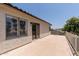 Large patio area with sliding door access provides an extension of indoor living at 1125 E San Carlos Way, Chandler, AZ 85249