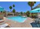 Inviting community pool with lush palm trees and comfortable lounge chairs at 11333 N 92Nd St # 1118, Scottsdale, AZ 85260