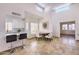 Inviting dining area with an artistic display, with bright natural lighting and a view into the living area at 11333 N 92Nd St # 1118, Scottsdale, AZ 85260