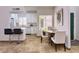Cozy dining area featuring a modern bar area and sleek white cabinets at 11333 N 92Nd St # 1118, Scottsdale, AZ 85260
